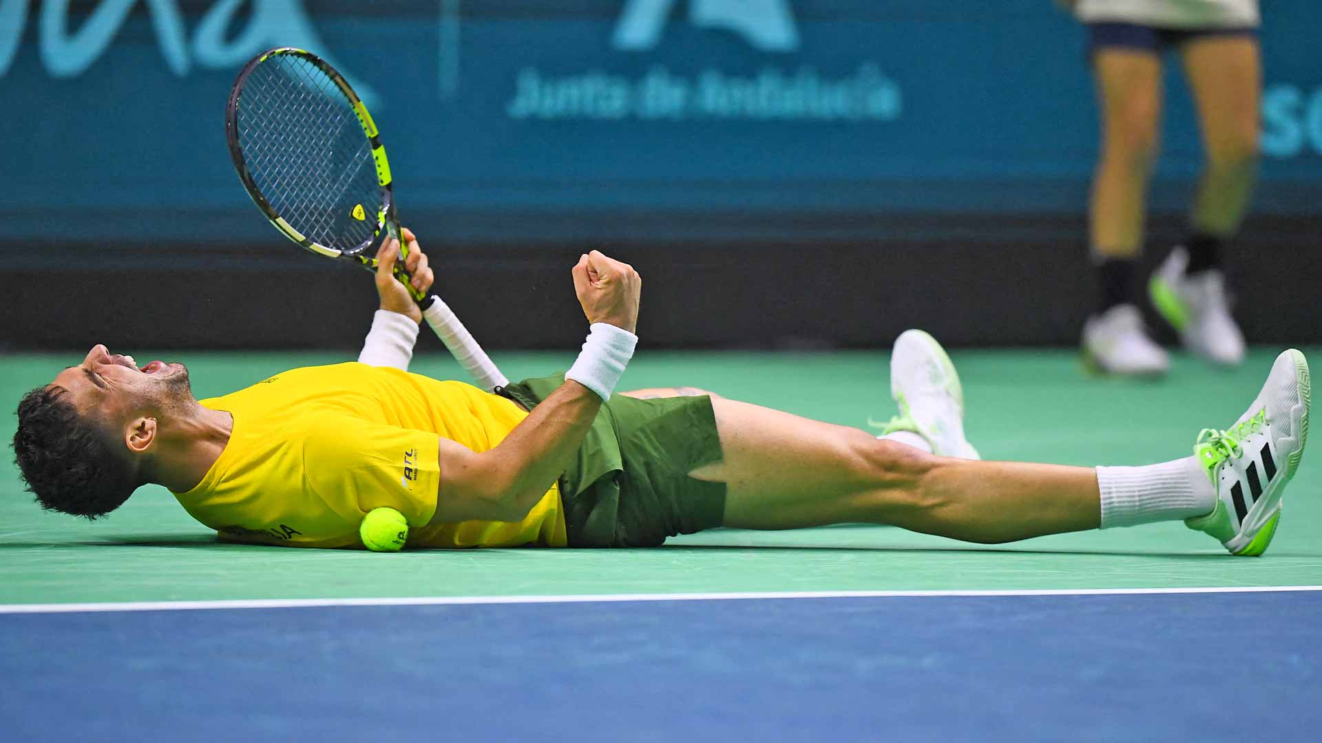 Thanasi Kokkinakis celebrates after saving four match points to defeat Ben Shelton on Thursday at the Davis Cup Final 8.