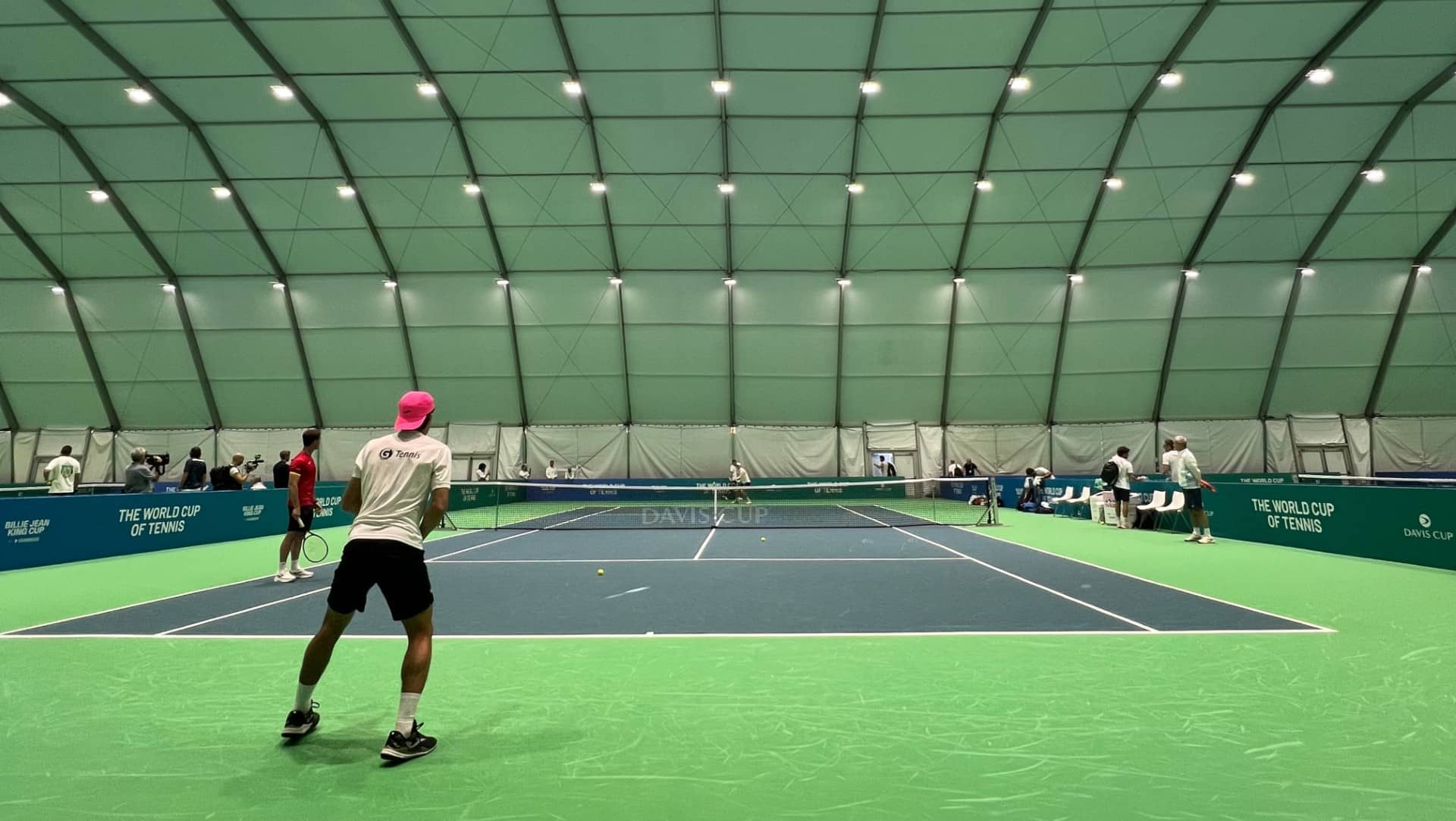 Andres Santamarta practises with <a href='https://www.atptour.com/en/players/jannik-sinner/s0ag/overview'>Jannik Sinner</a> at the Davis Cup Final 8 in Malaga.