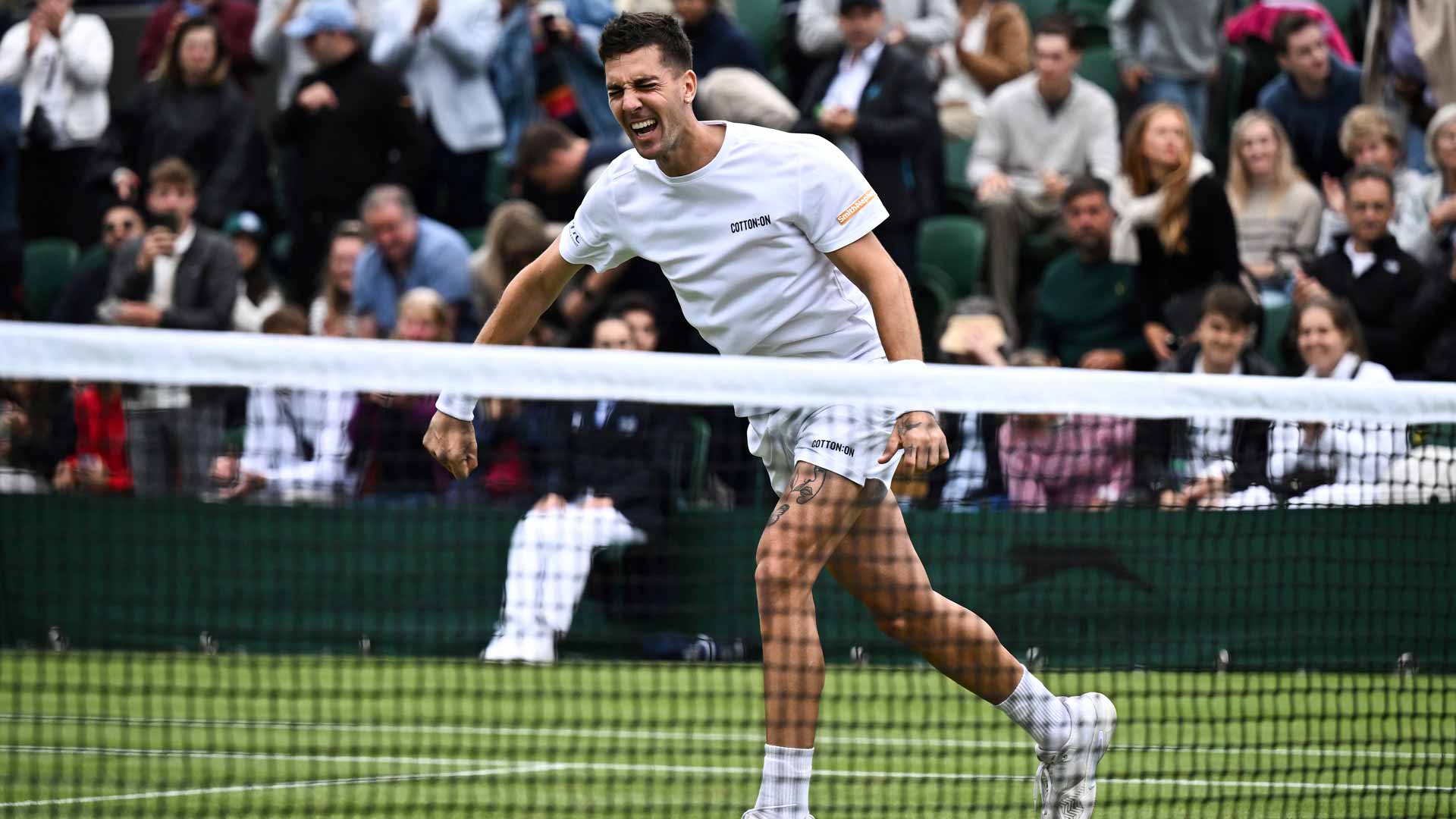 <a href='https://www.atptour.com/en/players/thanasi-kokkinakis/kd46/overview'>Thanasi Kokkinakis</a> celebrates his epic <a href='https://www.atptour.com/en/tournaments/wimbledon/540/overview'>Wimbledon</a> first-round victory.
