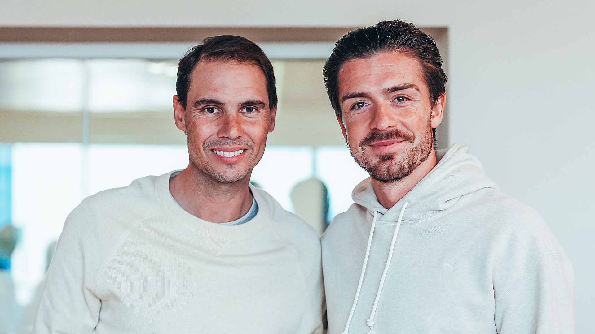 <a href='https://www.atptour.com/en/players/rafael-nadal/n409/overview'>Rafael Nadal</a> poses with Manchester City player Jack Grealish.