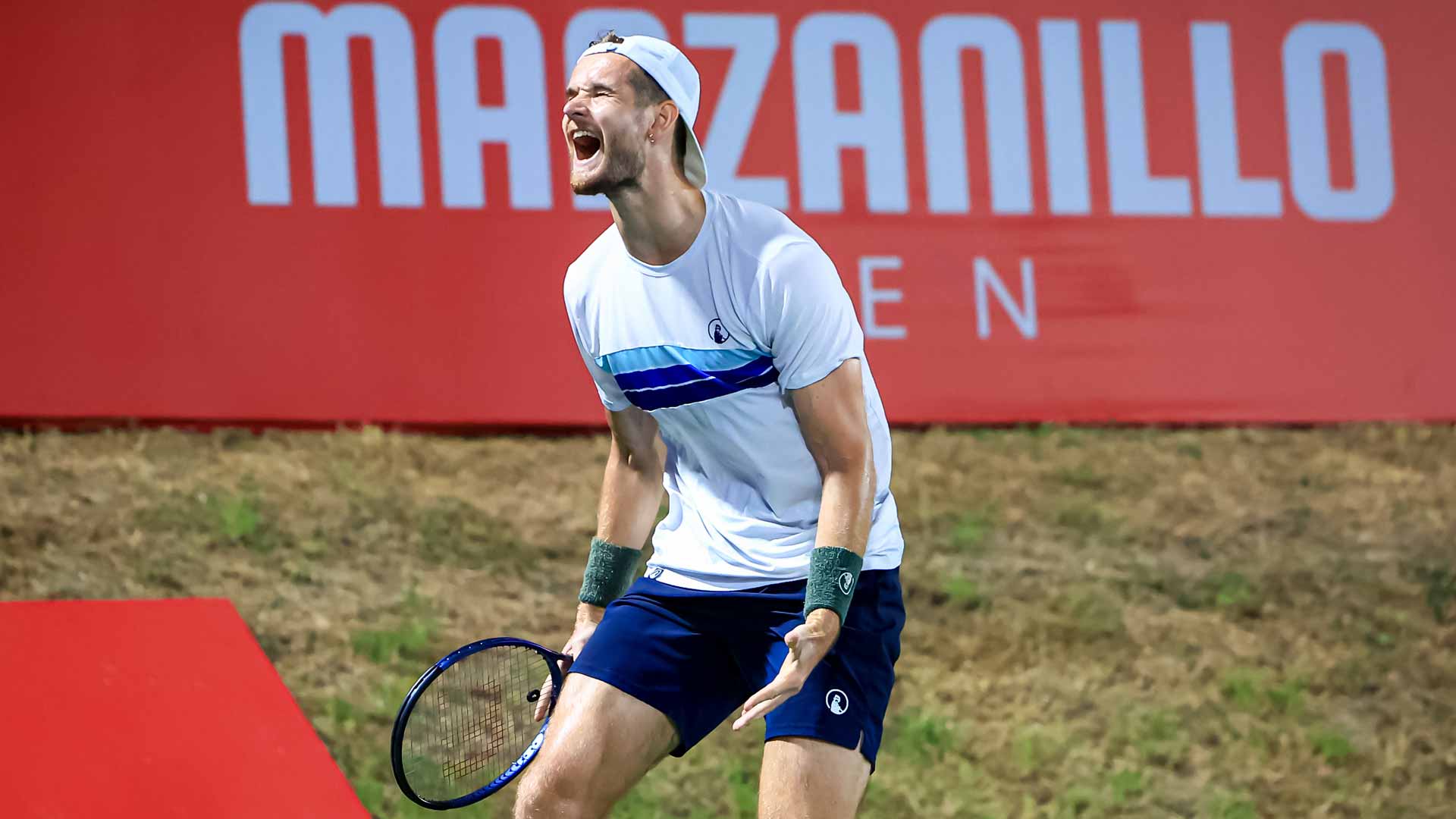 <a href='https://www.atptour.com/en/players/mats-rosenkranz/rh62/overview'>Mats Rosenkranz</a> celebrates winning the Manzanillo Challenger.