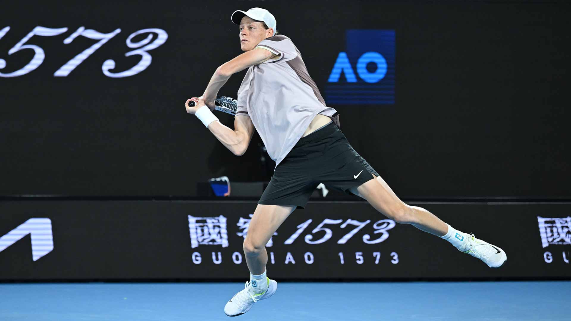 Jannik Sinner in action during the 2024 Australian Open championship match.