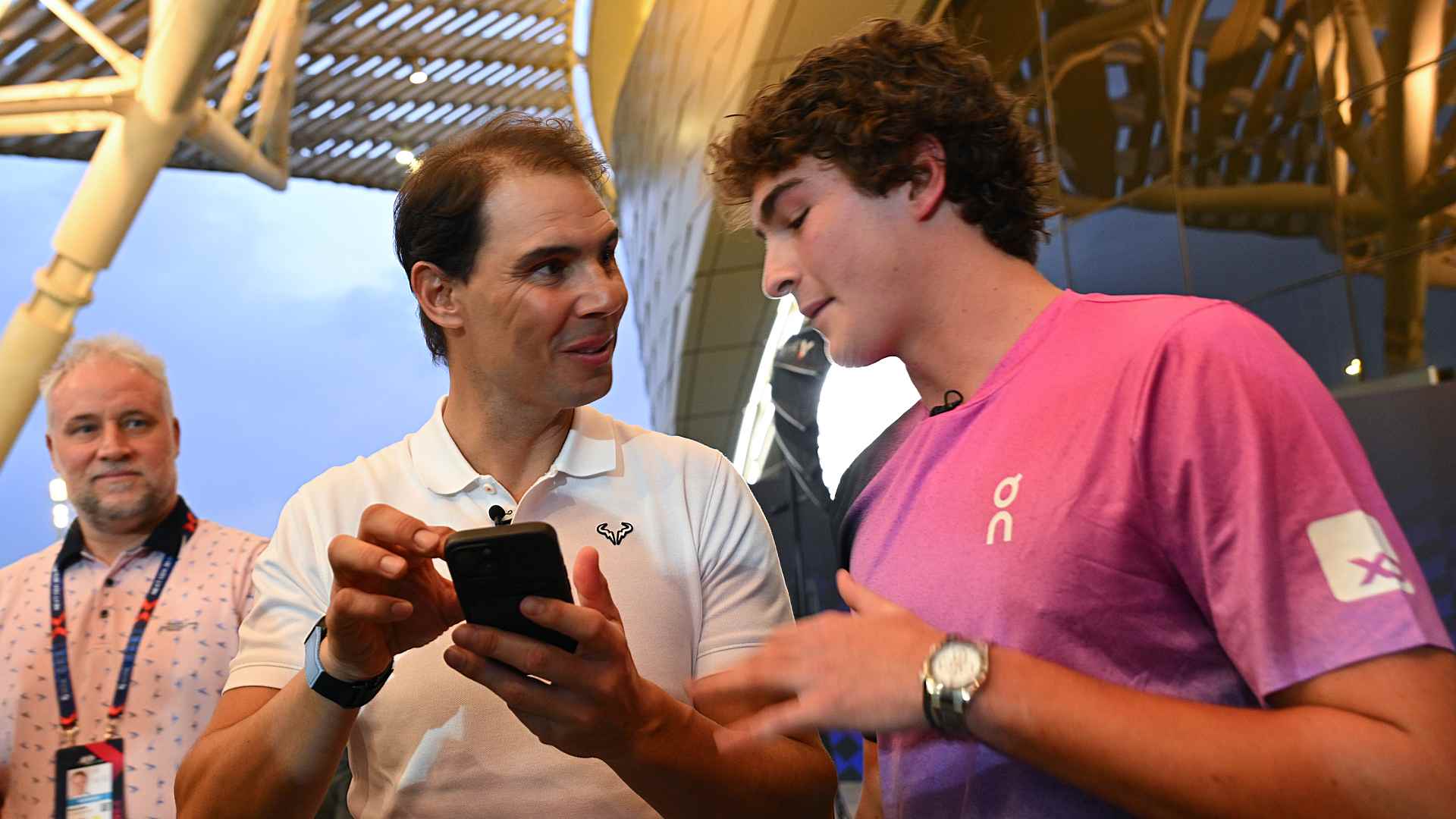 Nadal chats with Fonseca. 