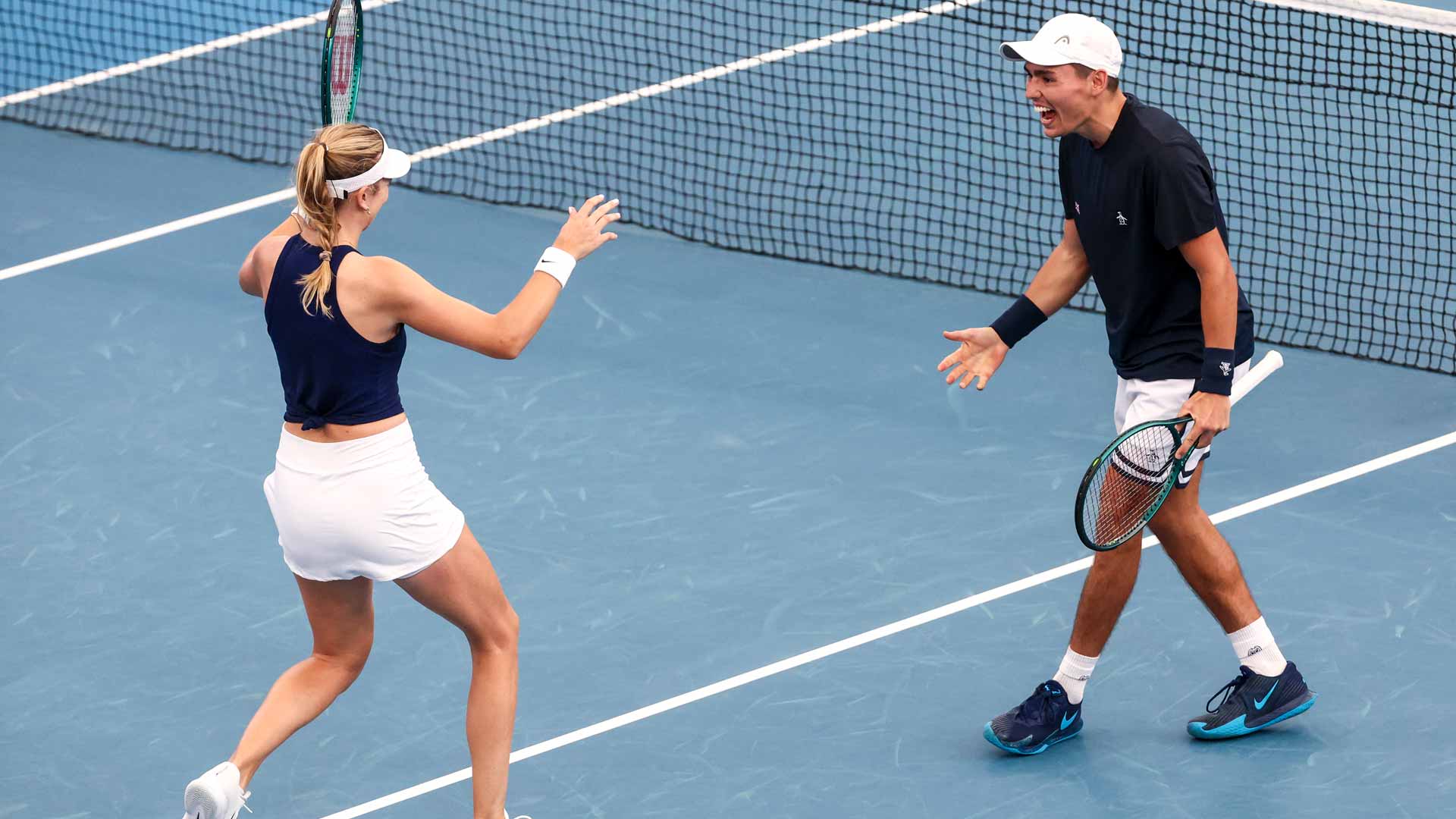 Katie Boulter and Charles Broom celebrate their victory against Team Argentina in Sydney.