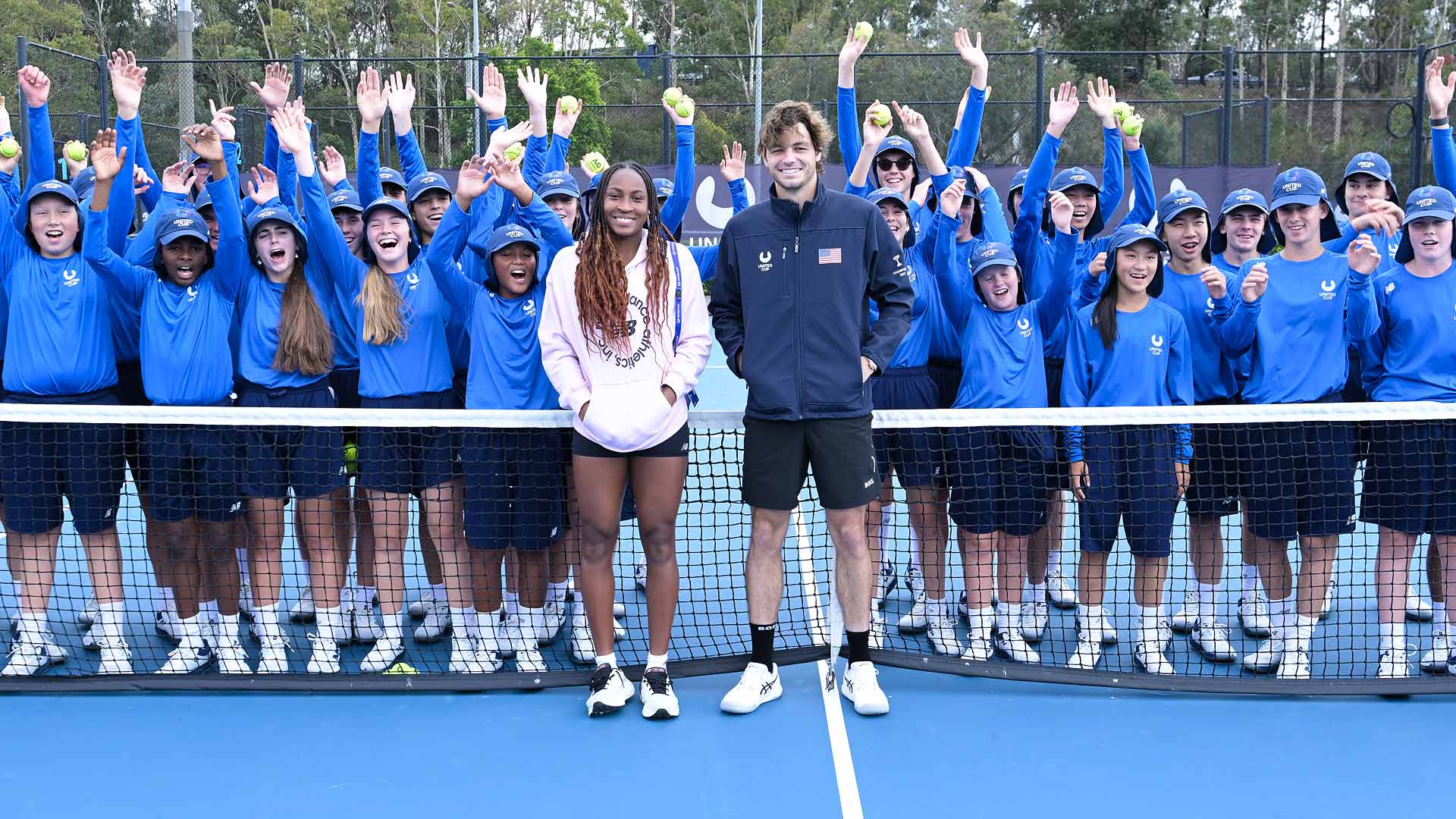 Coco Gauff and Taylor Fritz meet with ballkids in Sydney on Friday ahead of the United States' United Cup semi-final on Saturday.