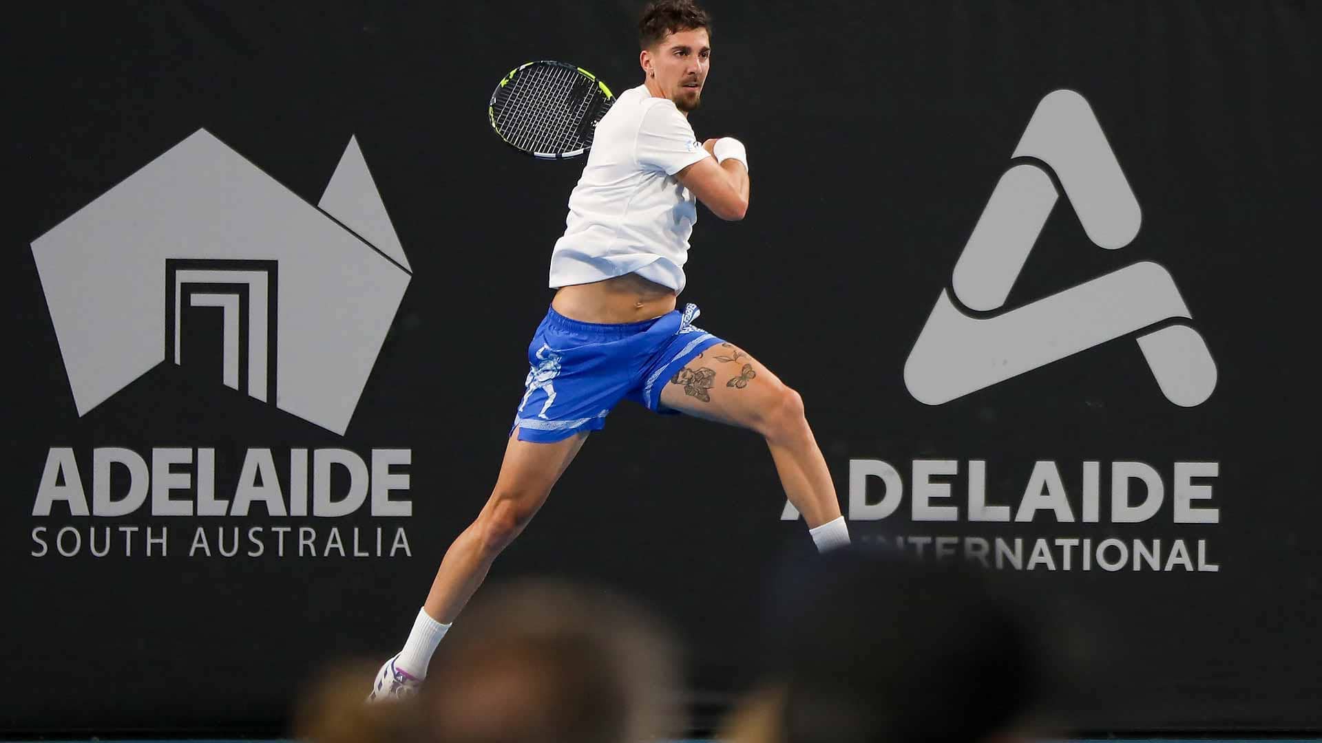 Thanasi Kokkinakis defeats Yoshihito Nishioka in three sets on Monday evening in Adelaide.