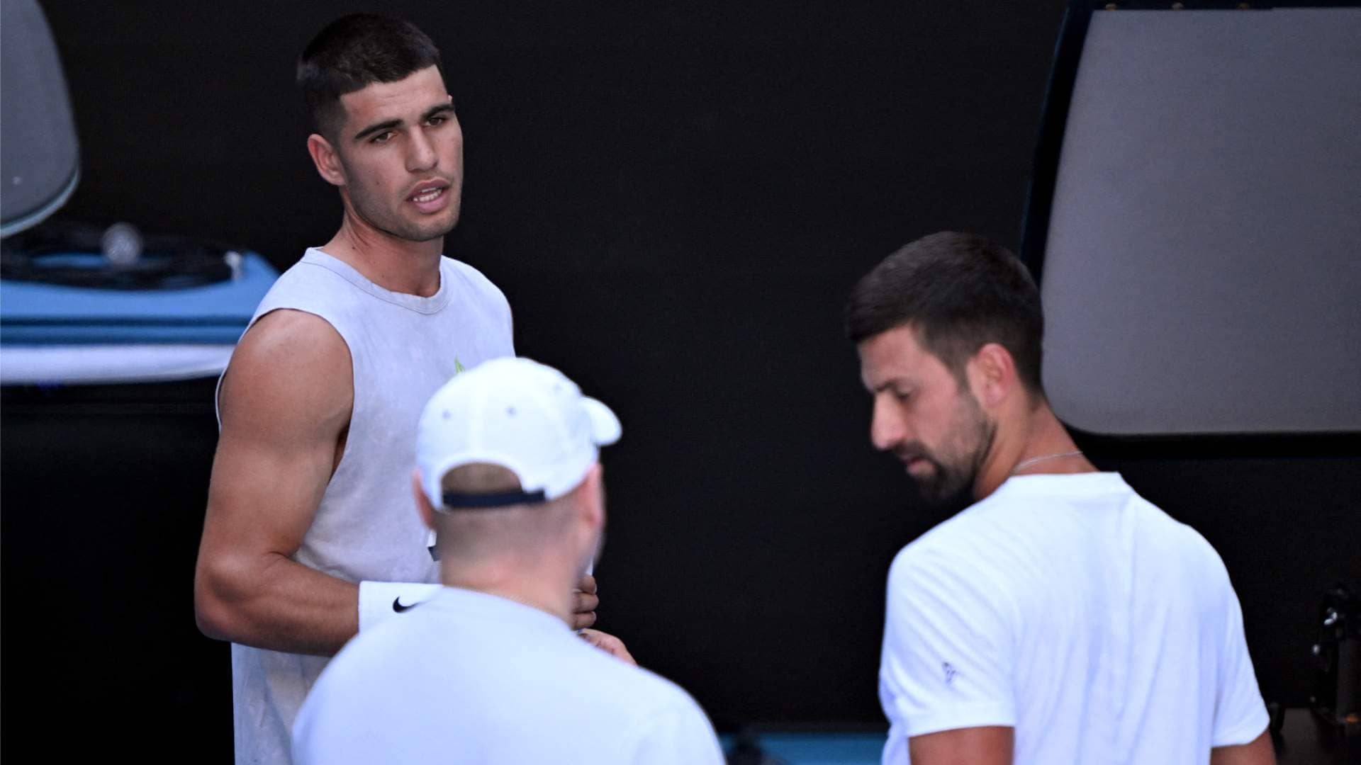 Carlos Alcaraz hits with Novak Djokovic ahead of the 2025 Australian Open. 