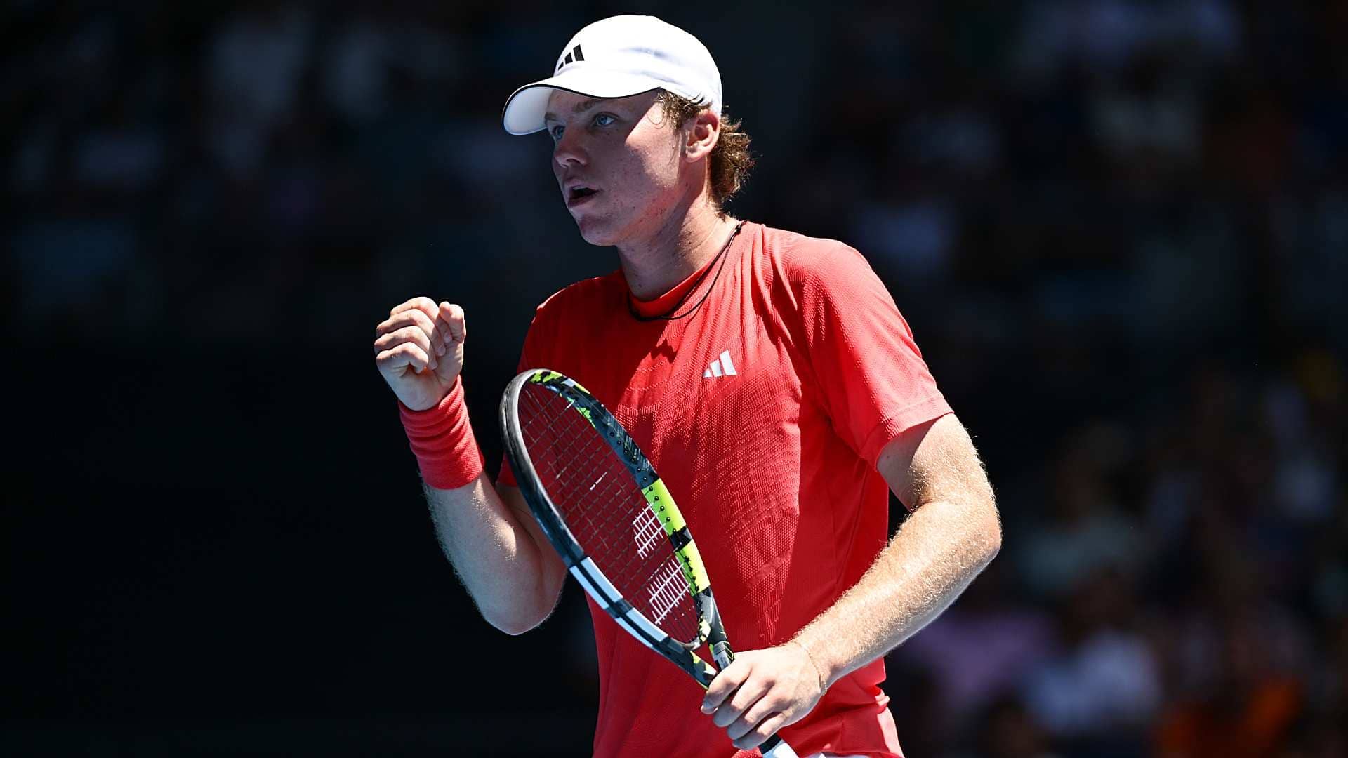 Alex Michelsen defeats Karen Khachanov at the Australian Open on Saturday.