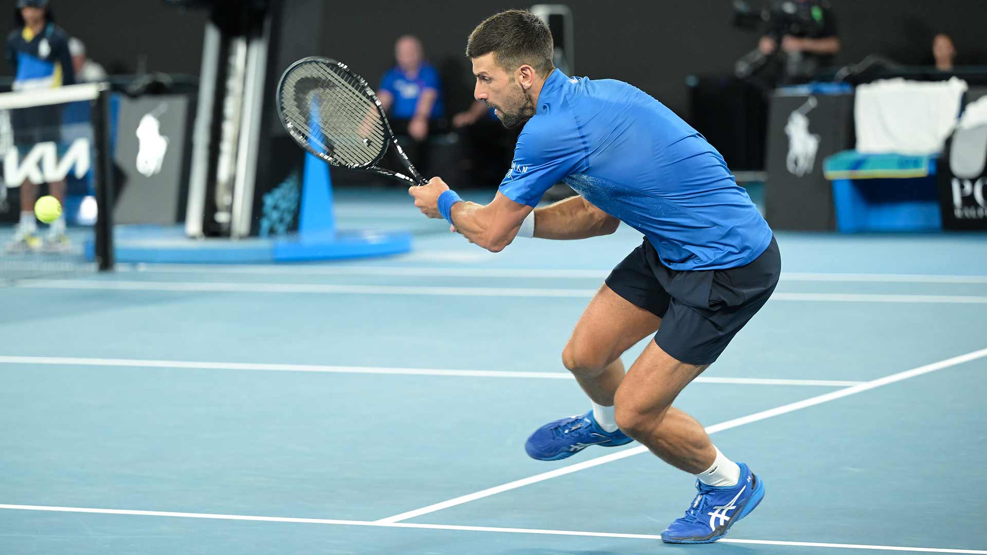 Novak Djokovic defeats Jiri Lehecka in straight sets on Sunday at the Australian Open.
