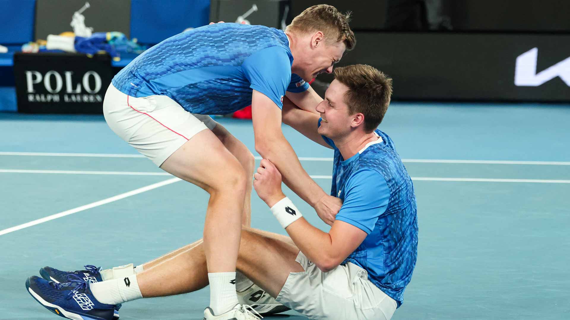 Harri Heliovaara and Henry Patten celebrate winning the Australian Open.