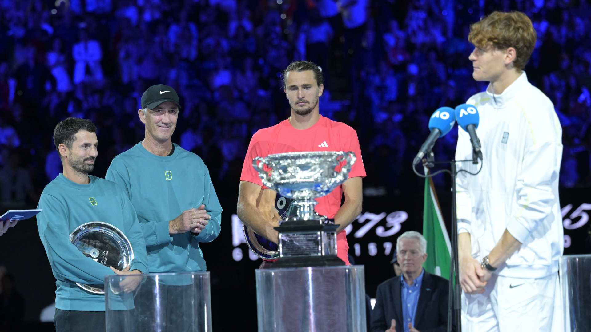 Jannik Sinner celebrates his successful title defence at the Australian Open.