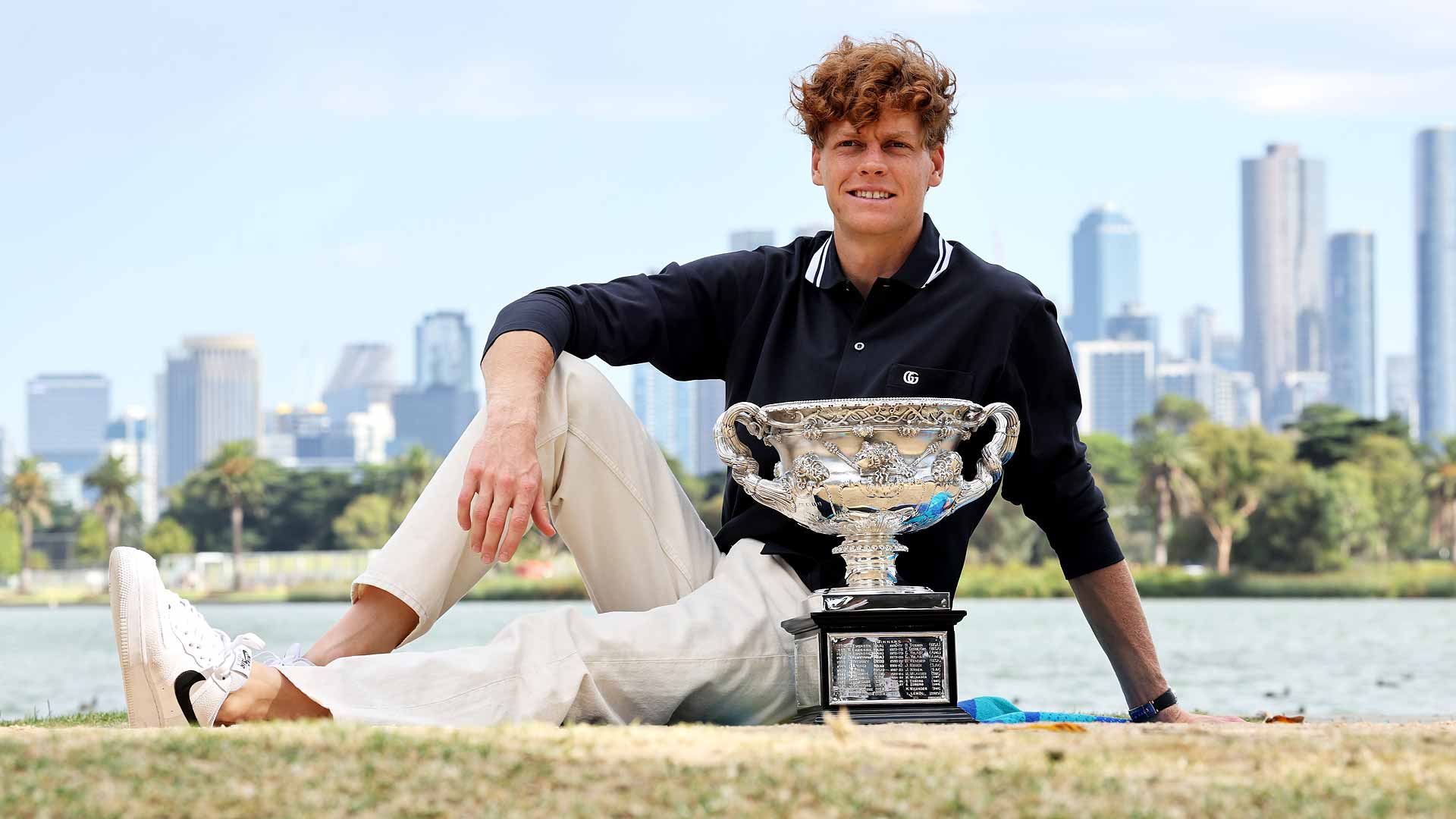 Jannik Sinner celebrates his Australian Open triumph at Albert Park Lake.