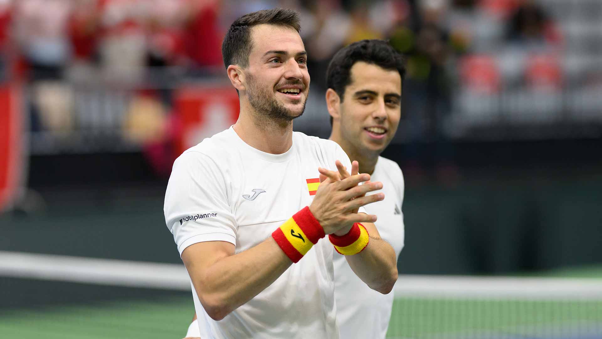 Pedro Martinez and Jaume Munar celebrate after clinching a decisive Davis Cup doubles win for Spain on Sunday in Biel.