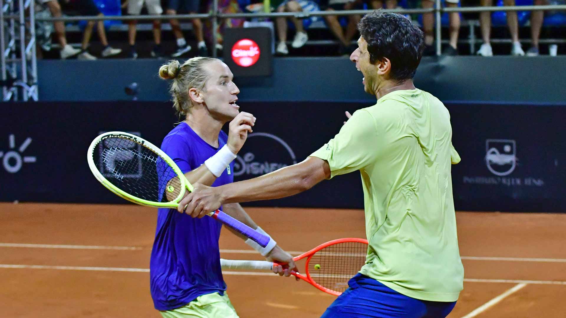 Rafael Matos and Marcelo Melo celebrate their Rio semi-final victory.