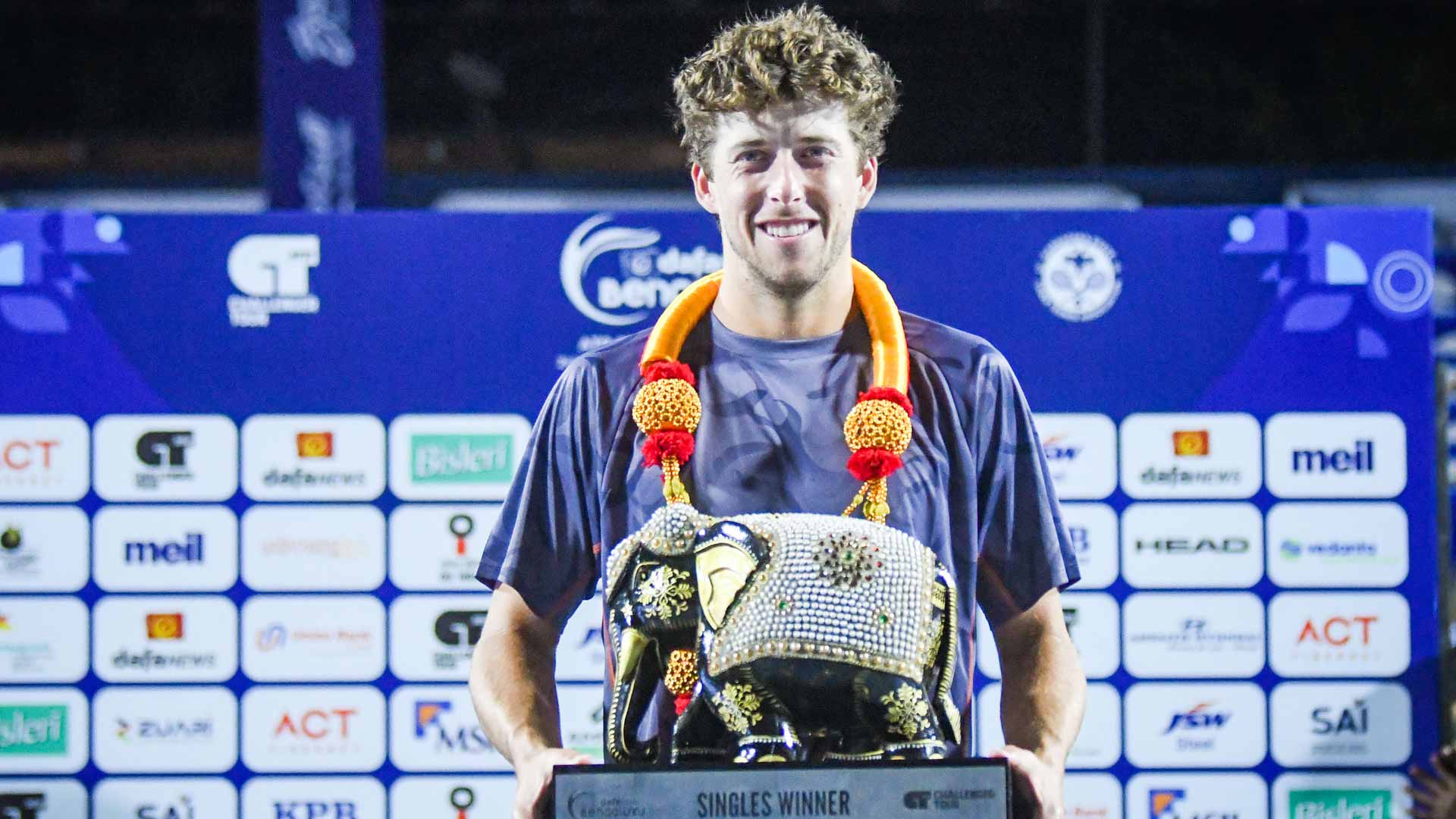Brandon Holt triumphs in Bengaluru, India.