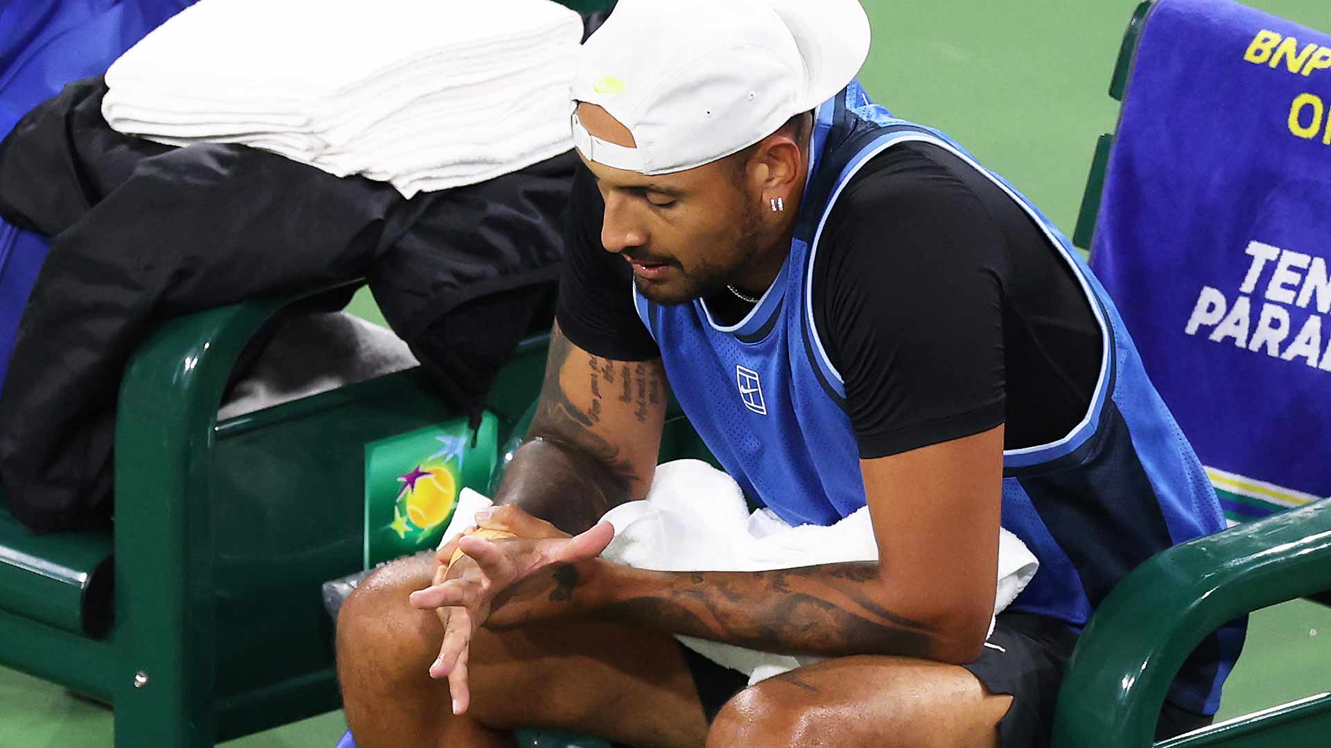 Nick Kyrgios retires three games into the second set with wrist pain.