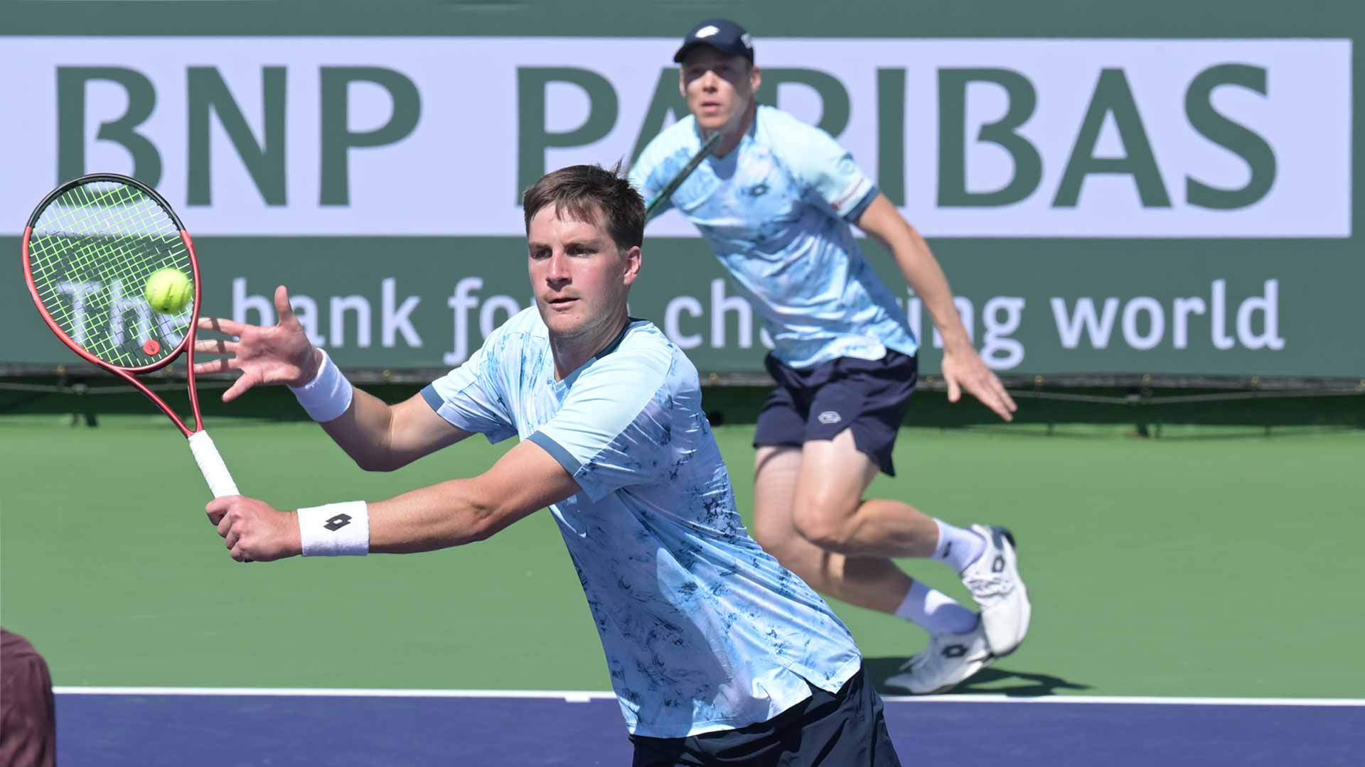Henry Patten and Harri Heliovaara in action on Monday at the BNP Paribas Open.