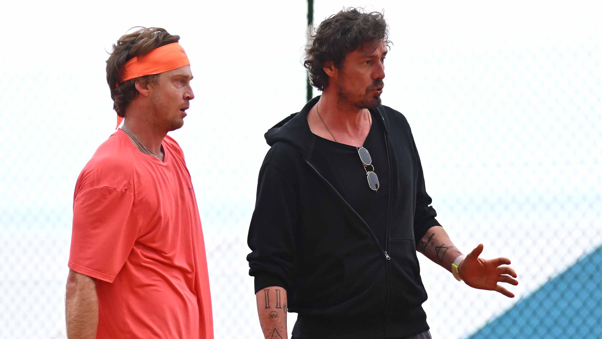 Andrey Rublev and Marat Safin have a discussion during training at the Rolex Monte-Carlo Masters.