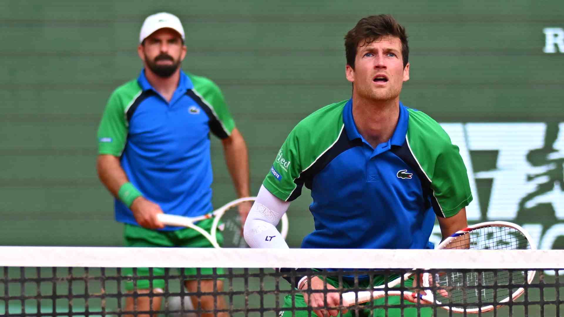 Romain Arneodo and Manuel Guinard in semi-final action at the Rolex Monte-Carlo Masters.