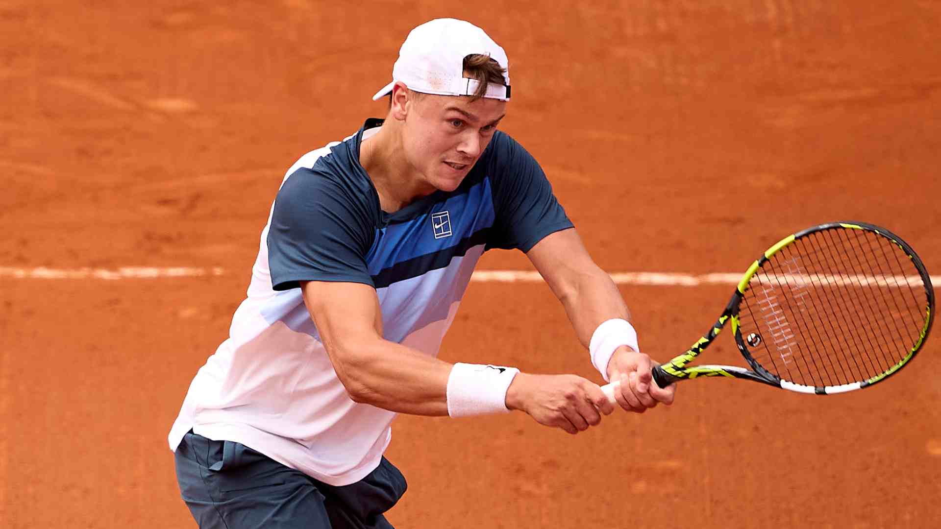Rune, Rublev earn bruising Barcelona wins