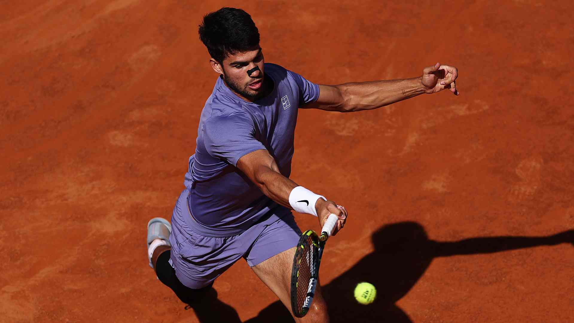 Alcaraz fights past Musetti, secures Rome final spot
