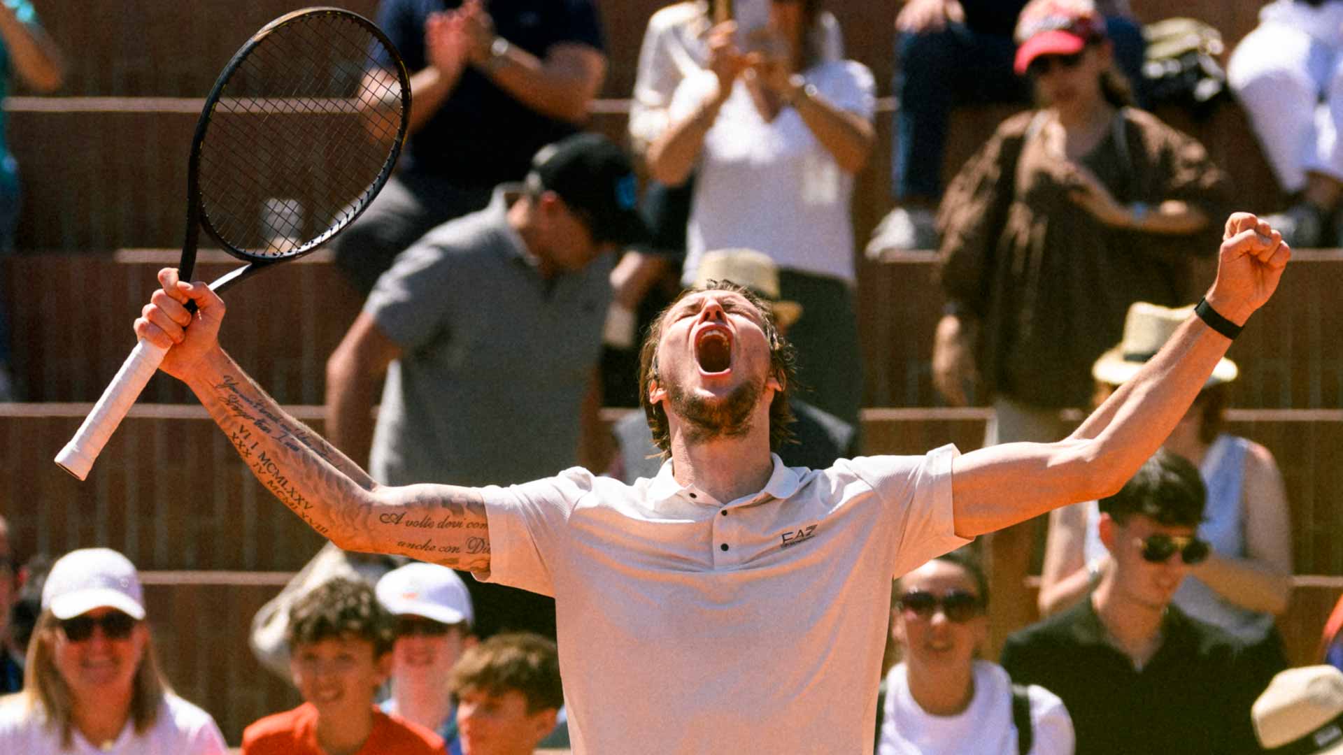 Alexander Bublik celebrates winning the Turin Challenger.