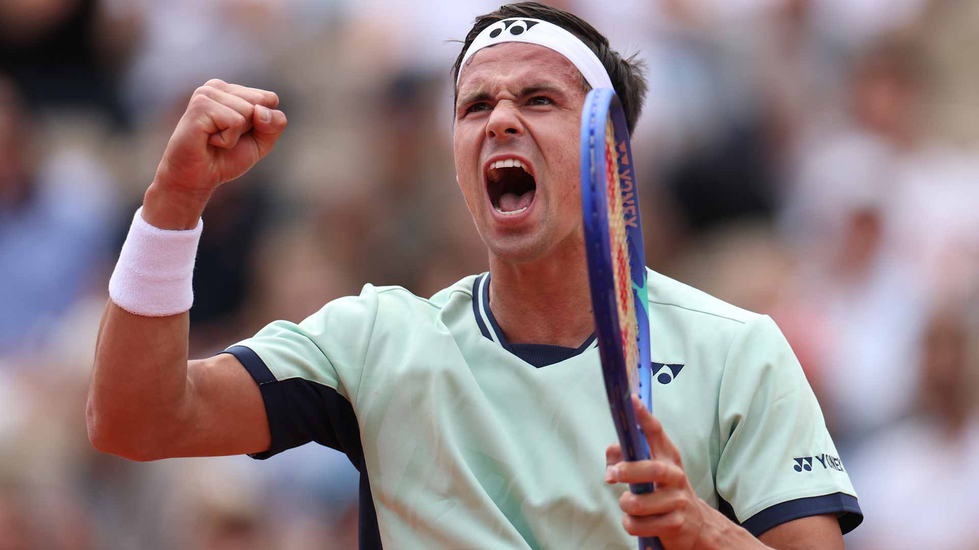 Daniel Altmaier upsets Taylor Fritz on Monday in four sets to reach the second round at Roland Garros.