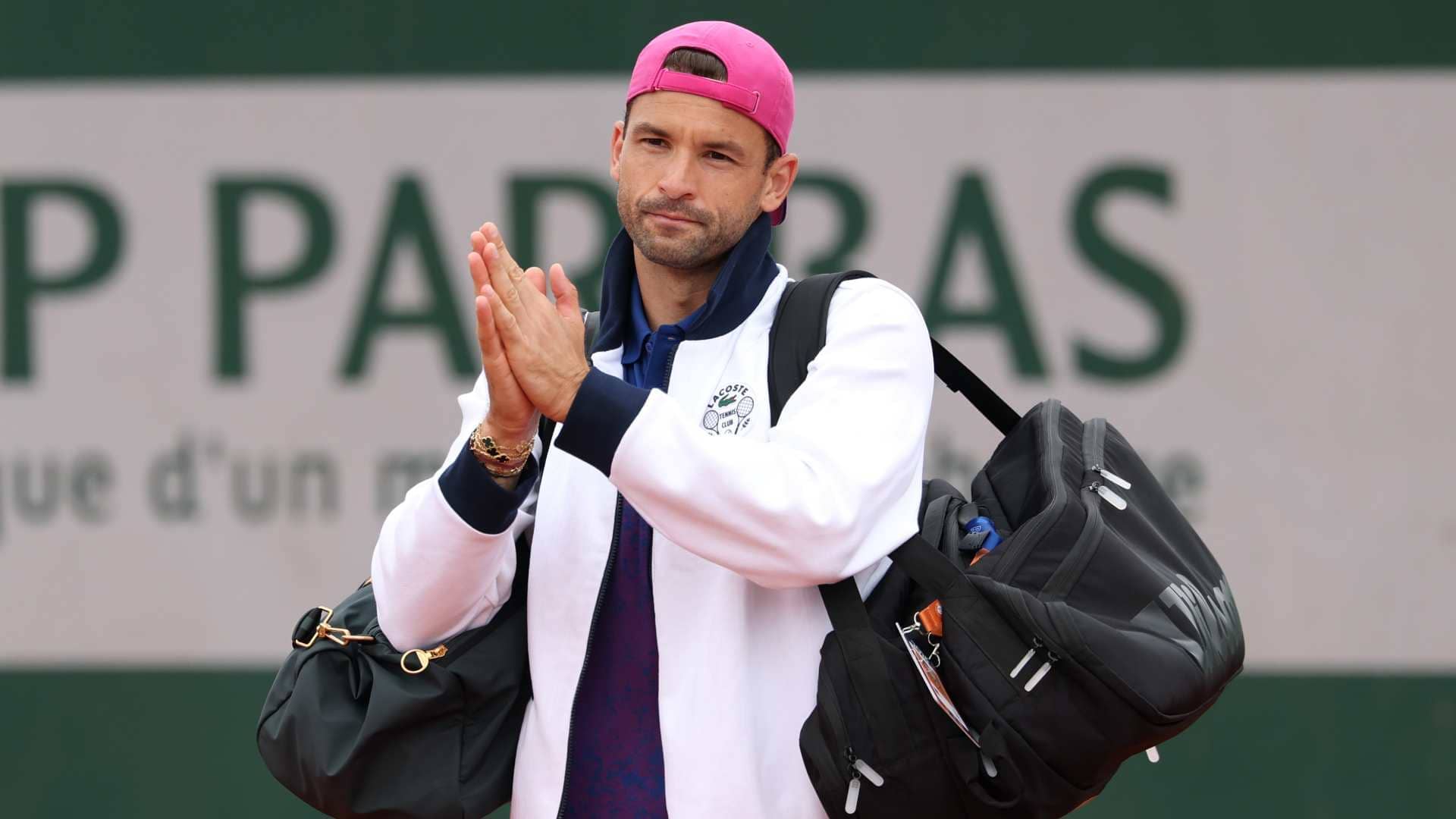 Grigor Dimitrov retires from his first-round clash with Ethan Quinn at Roland Garros on Tuesday.