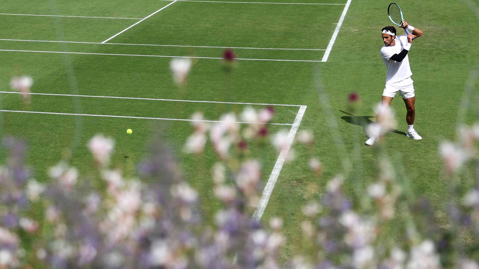 <a href='https://www.atptour.com/en/players/lorenzo-musetti/m0ej/overview'>Lorenzo Musetti</a> practises Tuesday at <a href='https://www.atptour.com/en/tournaments/wimbledon/540/overview'>Wimbledon</a>.