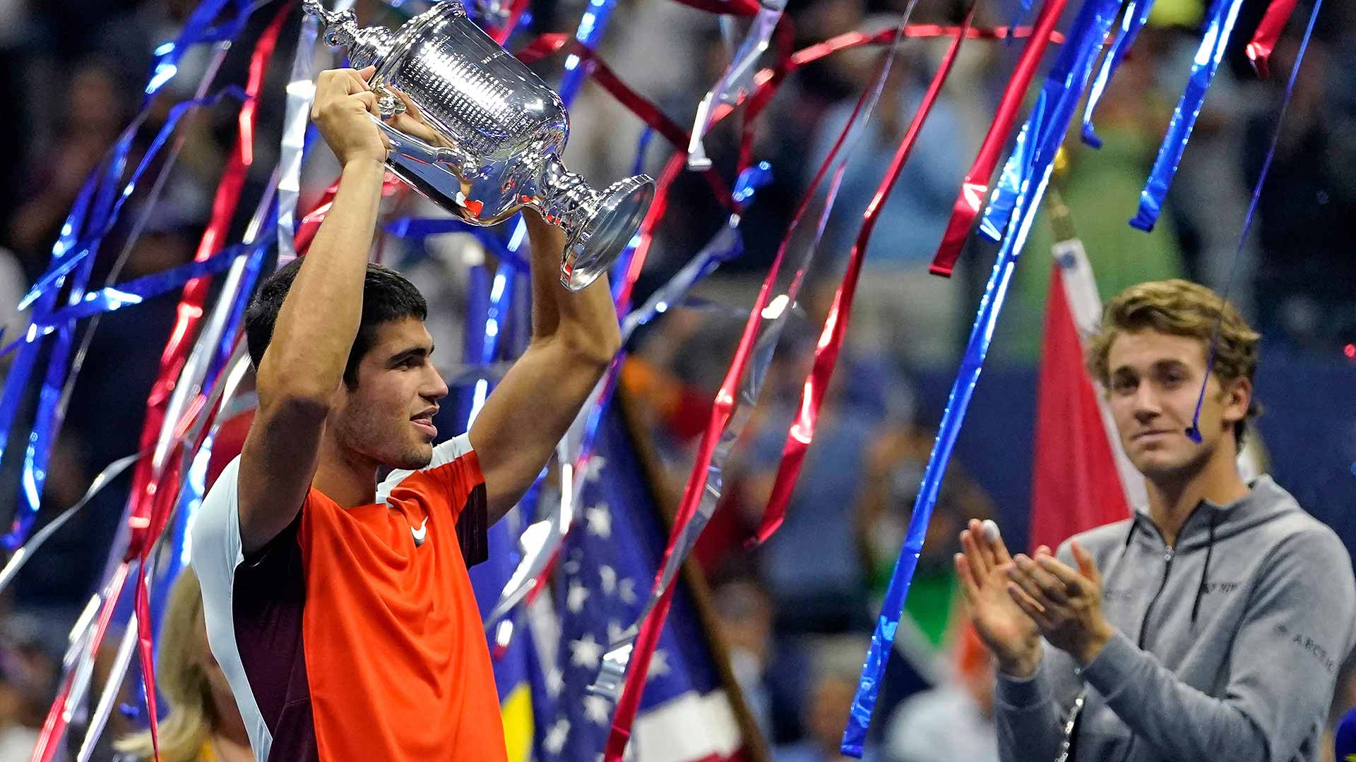 Carlos Alcaraz lays claim to the US Open trophy.