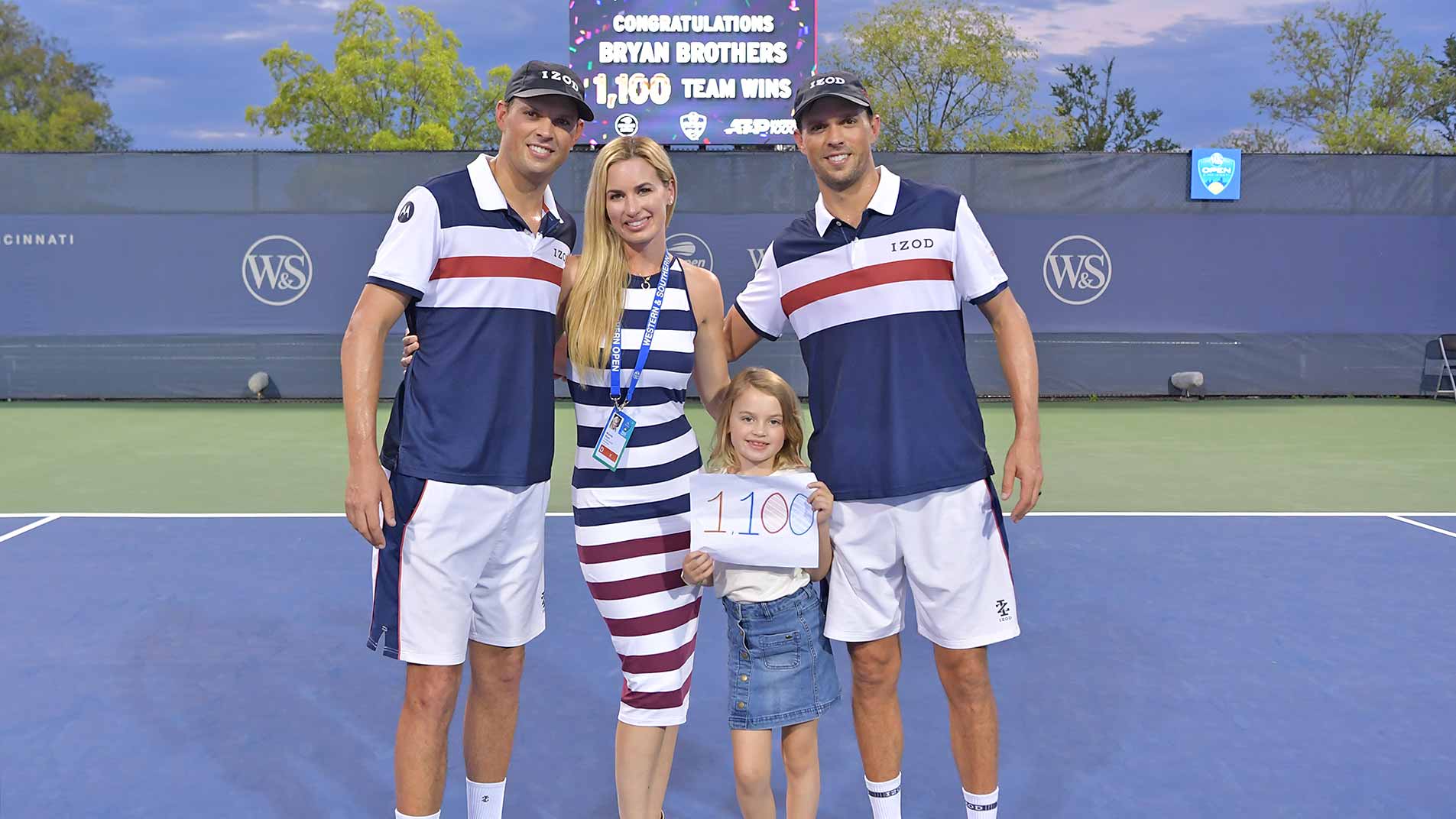 Bob Bryan with wife Michelle, daughter Micaela and brother Mike Bryan, celebrating the Bryan brothers' 1100th team win.