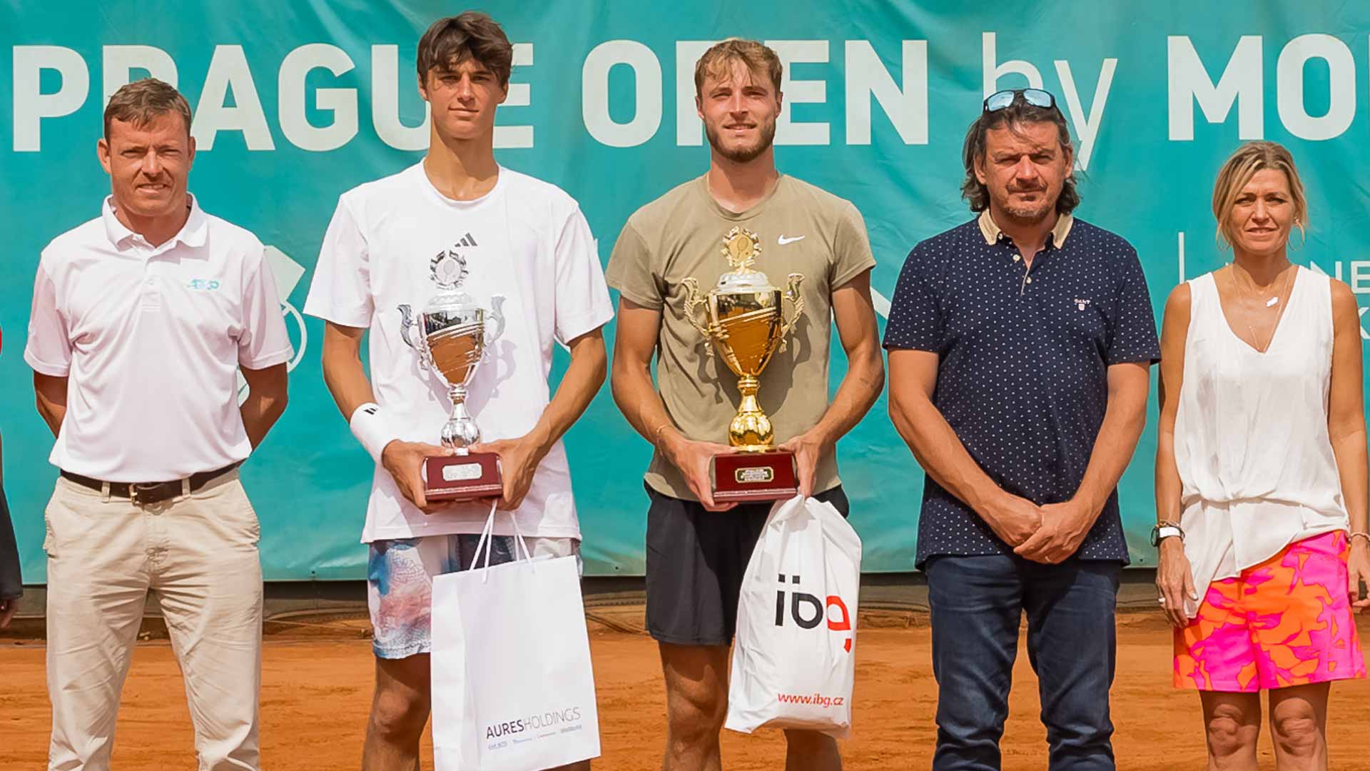 Rudolf Molleker (middle) poses during the Prague Challenger trophy presentation.