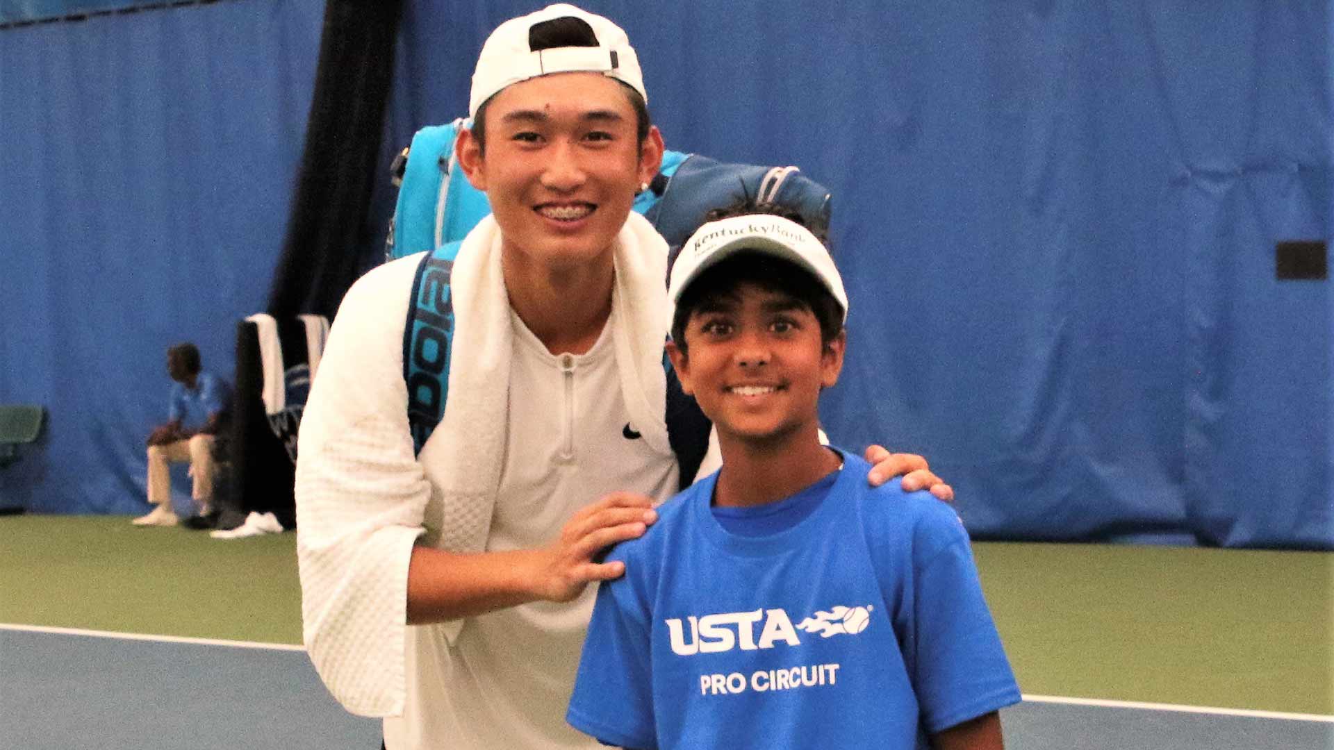 Shang Juncheng reunites with ballkid Atharva Dang.