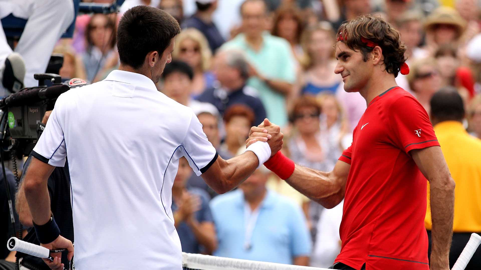 Novak Djokovic and Roger Federer at the 2011 US Open.