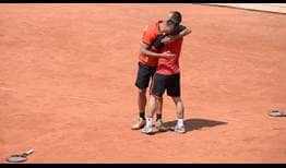Romanians Marius Copil and Adrian Ungur win their first team title in front of their home crowd.