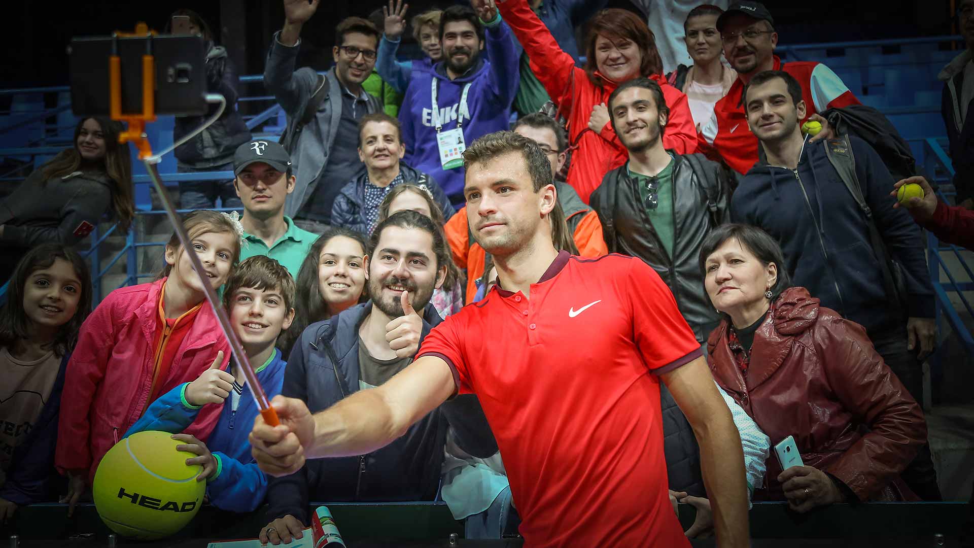 Grigor Dimitrov takes a selfie with fans after a successful outing in Istanbul.