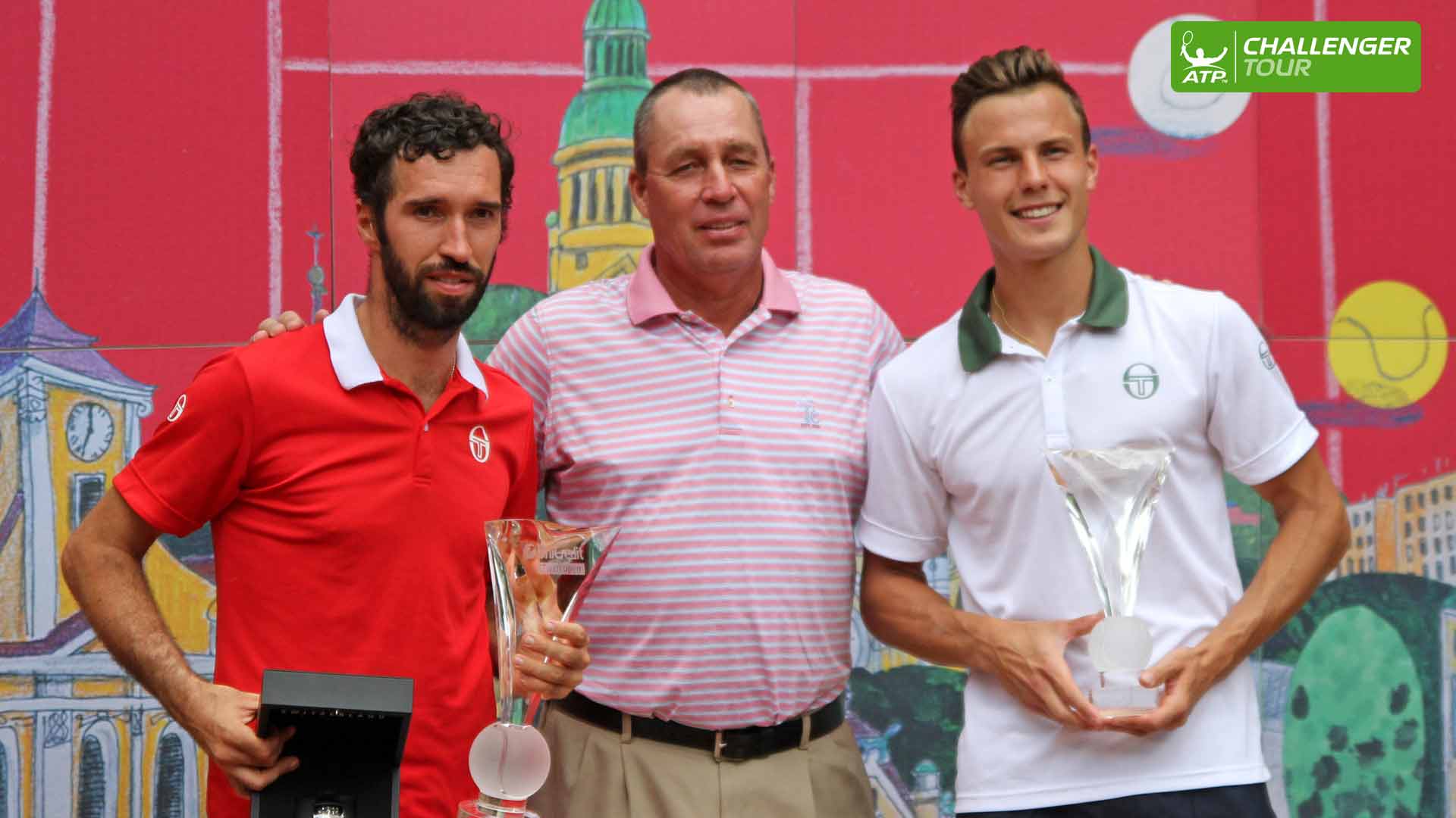 Ivan Lendl presents Mikhail Kukushin (L) and Martin Fucsovics with their trophies in Prostejov.