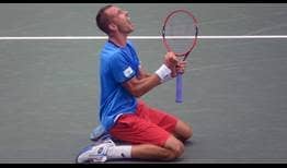 Lukas Rosol saved two match points against Jo-Wilfried Tsonga to give the Czech Republic a 1-0 lead over France in their Davis Cup quarter-final.