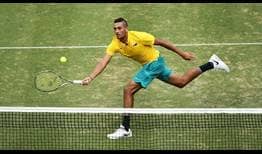 Nick Kyrgios teams with Bernard Tomic to give Australia a 2-0 lead in their play-off tie.