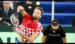 Ivo Karlovic recovers from a 4/6 deficit in the second set tie-break by winning four straight points against Argentina's Juan Martin del Potro on Friday.