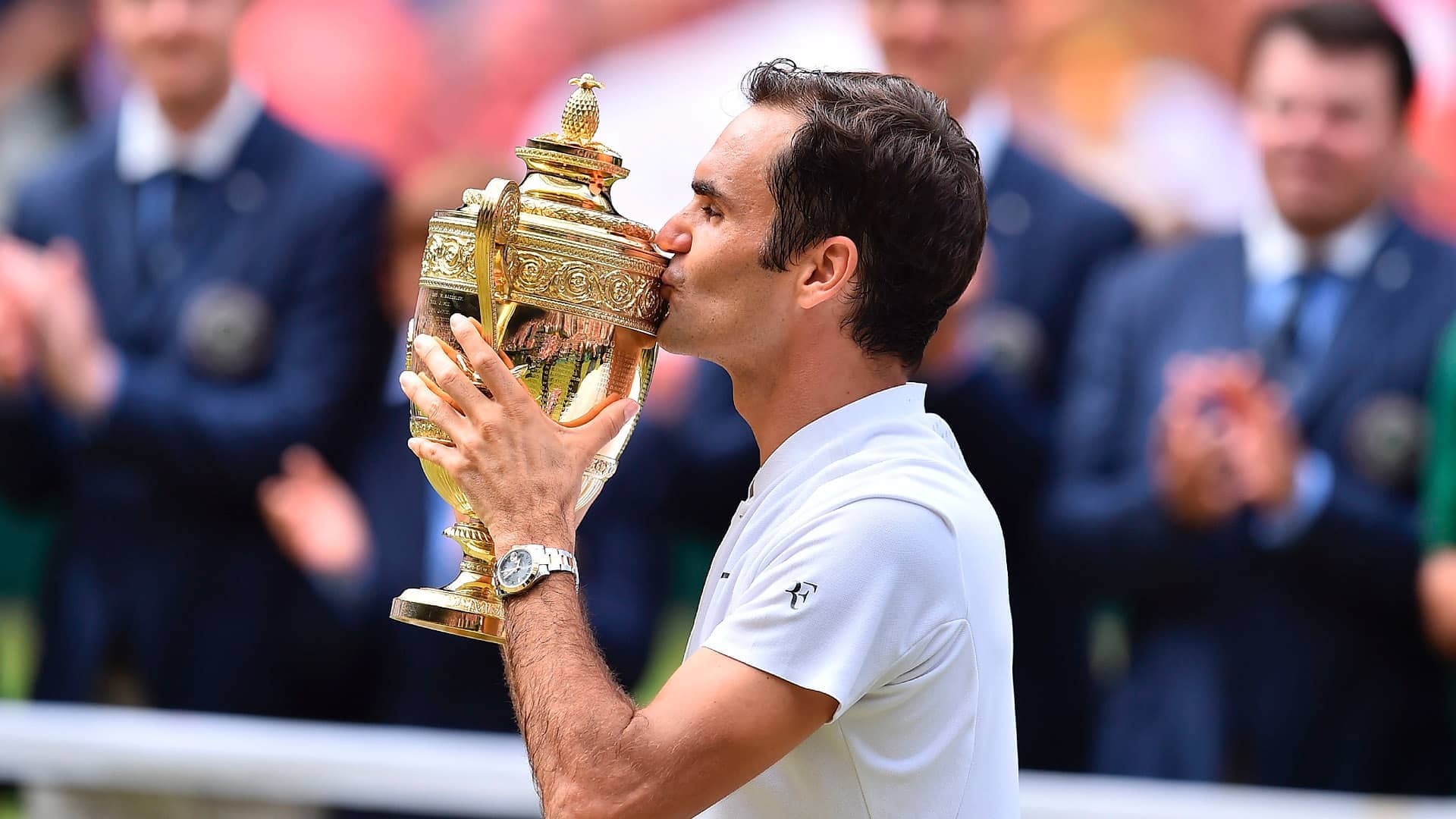 Roger Federer is reunited with the trophy as the 2017 Wimbledon Champion.