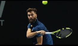 In-form Benoit Paire is through to the Sydney semi-finals after a straight sets win over defending champion Gilles Muller on Thursday.