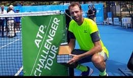 Stephane Robert celebrates winning the title in Burnie, Australia, becoming the second-oldest champion in ATP Challenger Tour history.