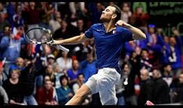 Adrian Mannarino wins his first-ever Davis Cup rubber to send France to the quarter-finals.