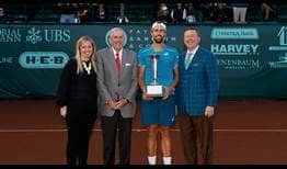 Steve Johnson is presented with the Langston Trophy for sportsmanship in Houston.