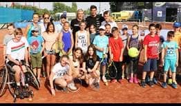 #NextGenATP Canadian Denis Shapovalov and Hungarian Zsombor Piros assist at kids' day at the Gazprom Hungarian Open on Wednesday. 