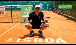 Tommy Robredo returns to the winners' circle for the first time in five years, prevailing in Lisbon.