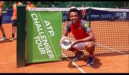 Hugo Dellien lifts his third ATP Challenger Tour trophy of 2018 after prevailing in Vicenza, Italy.