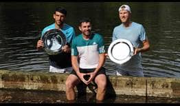 Franko Skugor and Dominic Inglot, as promised, celebrated their Libema Open triumph in the tournament lake.