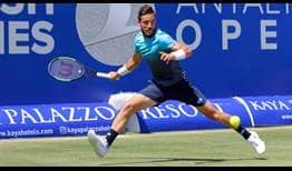 Damir Dzumhur saves two set points in the second set to beat Jiri Vesely on Friday for a place in the Antalya final.